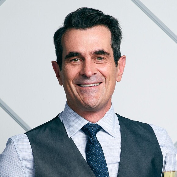 Official Modern Family cast portrait of Ty Burrell as Phil Dunphy.