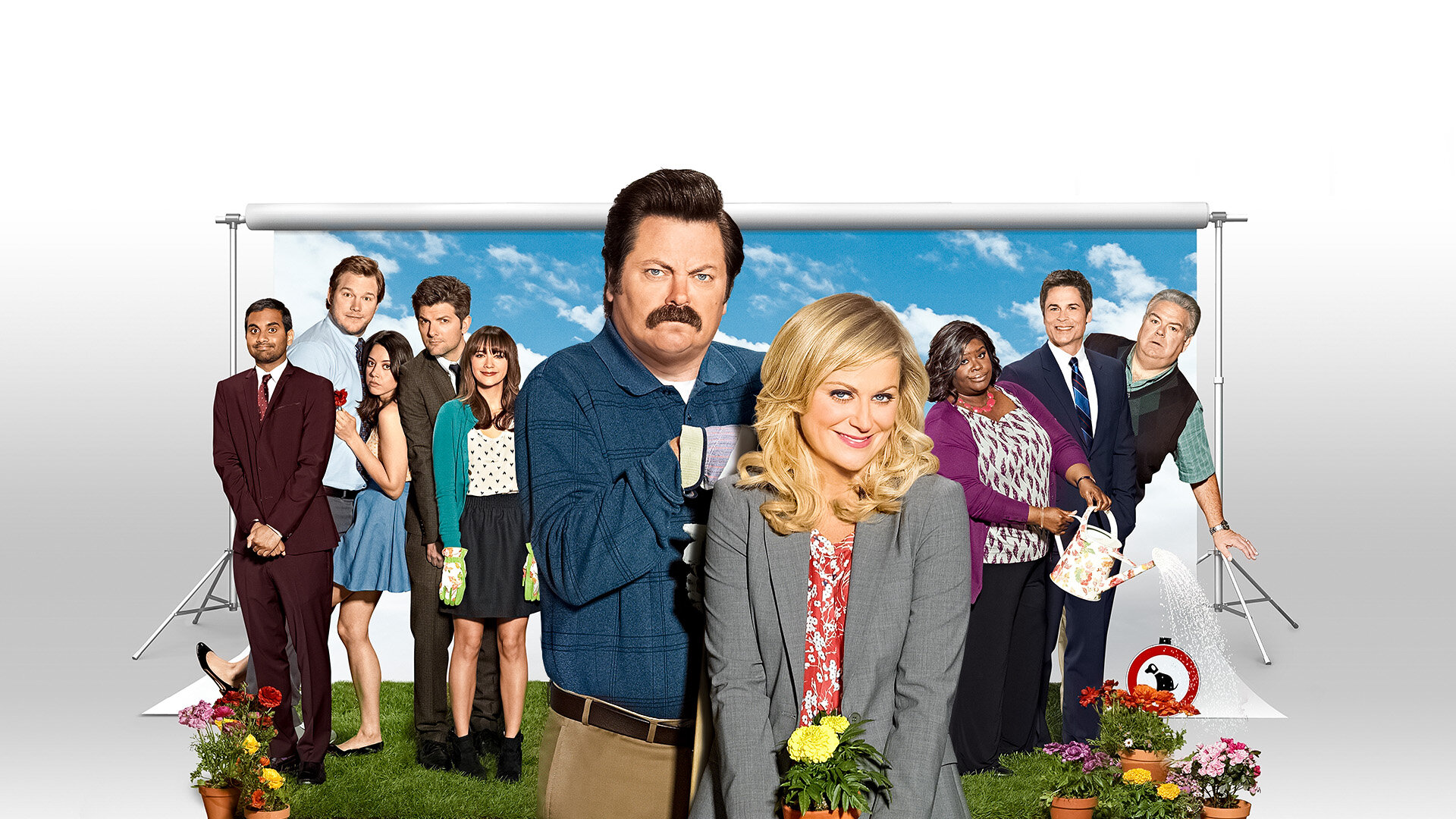 Parks and Recreation ensemble key art with Leslie Knope, Ron Swanson, April Ludgate, Andy Dwyer, Tom Haverford, Ann Perkins, Donna Meagle, and Jerry Gergich.
